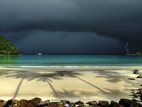 Sunshine and lightning during the rainseason on Ko Kood